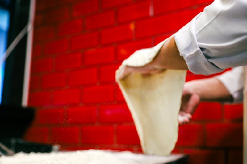 Pizzana kitchen — artisan pizzana being prepared in West Hollywood