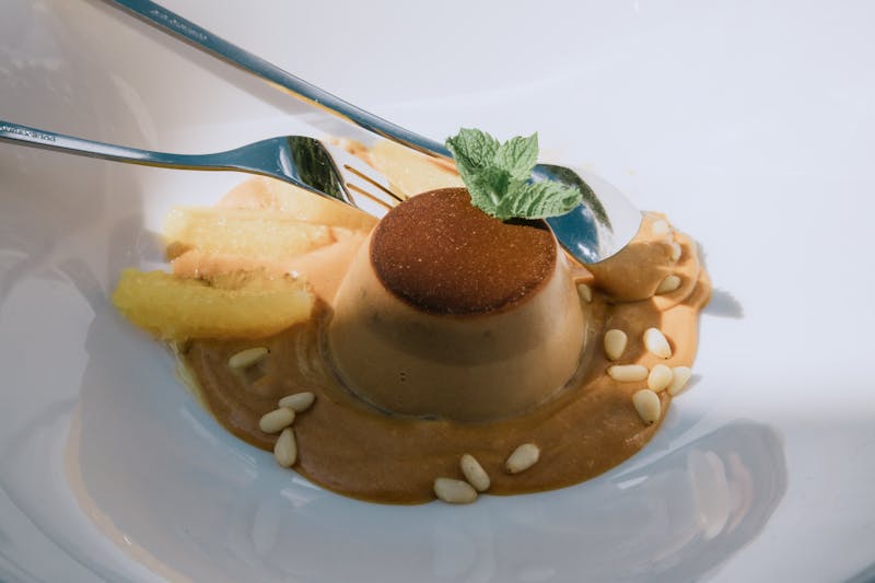 Panna cotta with strawberry coulis and mint